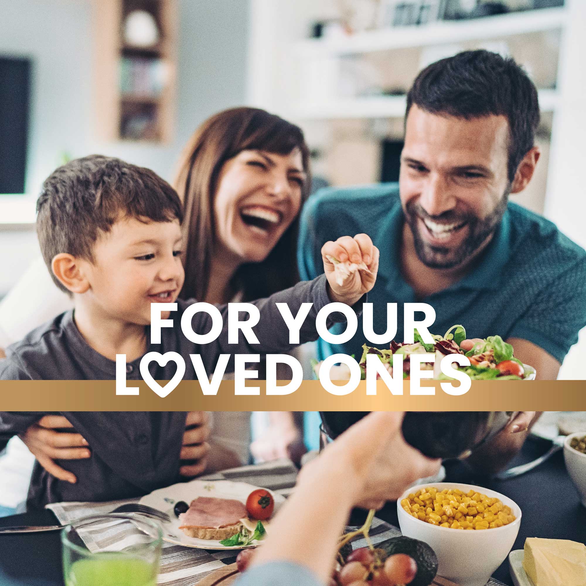 Happy family sharing breakfast over the dining table, promoting a healthy lifestyle with Frisk supplements text overlay reads “For your loved ones” 