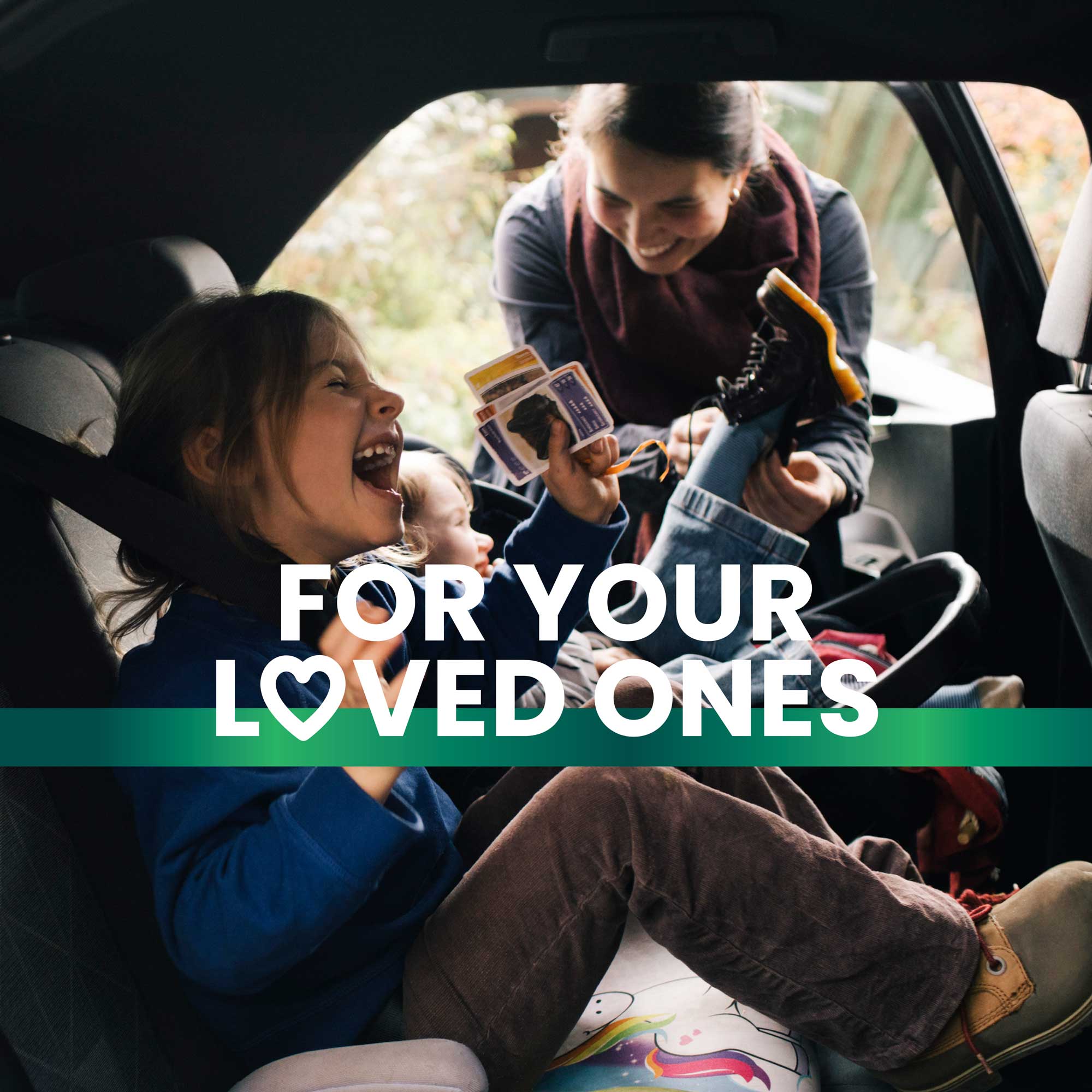 Cheerful children smiling in car backseat wearing seatbelts, enjoying family road trip, promotional text overlay 'For your loved ones' Frisk supplements for healthy life